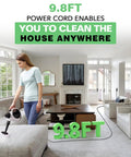 Woman using Heavy Duty Pressurized Handheld Steam Cleaner With Ten Piece Accessory Set on couch with 9.8FT power cord.