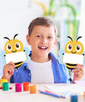 Child holding Bee Cutouts For Classroom Decorations 50 Pack Name Tags And Desk Nameplates Cute Bee Style Labels For Cubbies 5.9 By 4.7 Inches