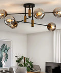 6 Light Glass Globe Sputnik Chandelier With Dope Matte Black And Gold Finish Modern Ceiling Fixture in living room