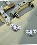 Heavy Duty Sliding Door Support Wheels With Adjustable Caster Rollers And Precision Bearings Smooth Operator Barn Door Hardware Replacement parts on wood surface.