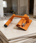 Rock Solid Heavy Duty Lifter Tool For DIY Pros And Construction Crews Auto Adjusting Jaw Works From 11 Mm To 21 Mm Fits Any Slab Easy Grip Handle Handles Up To 330 Pounds No Sweat Needed on stacked tiles