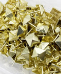 Real Deal Golden Square Upholstery Tacks Heavy Duty Shanks For Couch And Woodwork Revival 200 Pc kit of shiny golden decorative tacks.