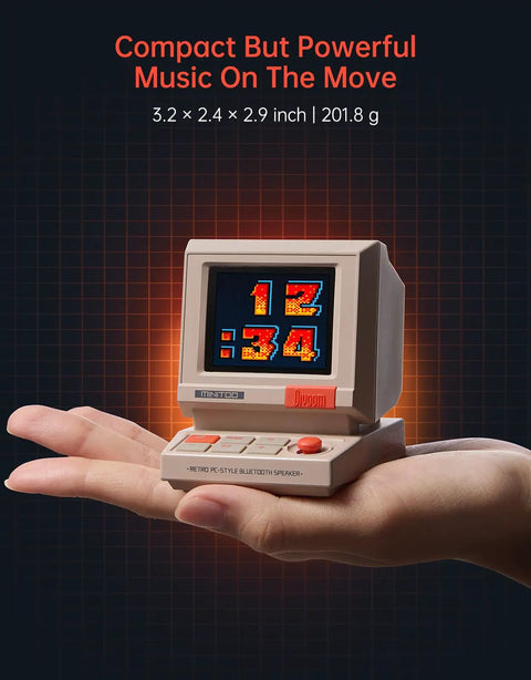 Mini Retro PC Style Speaker With Pixel Screen And DIY Faces Bluetooth And USB Audio Alarm Clock And White Noise in hand