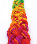 Rainbow-colored braided yarn skein; thick wool-like strands in purple, pink, red, orange, yellow, green, blue.