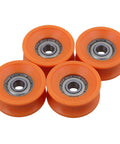 Top Shelf 4 Piece U Groove Pom Pulley Pack Featuring A Clean 6 mm Bore And 30 mm Rim, orange pulleys with steel bearings.