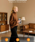 Person holding Power Saving 450W Space Heater With Remote Wall Outlet Plug As Seen On TV Adjustable Thermostat In Living Room