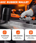 Person holding 16 oz rubber mallet from Two Pack Rubber Mallet Hammer Set With 16 Oz Soft Mallet And 33mm Double Faced Mallet Replaceable Heads Fiberglass Handle Damage Free For Flooring Tile Woodworking Furniture Assembly And DIY Projects