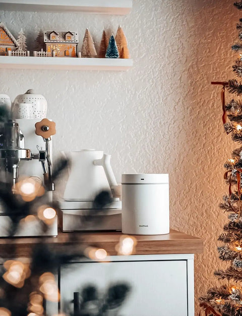 Automatic Vacuum Coffee Canister Keeps Your Daily Brew Stash Hella Fresh For Months With Simple One Touch Press And Rust Resistant Stainless Steel Build on kitchen counter.