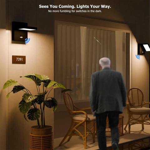Motion Sensor Outdoor Wall Light With Adjustable Swivel Lamp Head LED Exterior Porch Light illuminating patio area