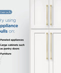 Champagne Bronze 24 Inch Center-To-Center Appliance Pull installed on white paneled cabinets.