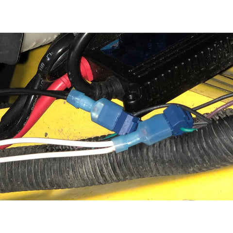 Blue nylon-insulated T-Tap quick-disconnect terminals on automotive wiring harness