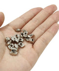 Hand holding Hammer Head T Nuts Set 100 Pieces 2020 Series Carbon Steel M4 T Slot Nuts Aluminum Profile Fastener Assortment Nickel Plated