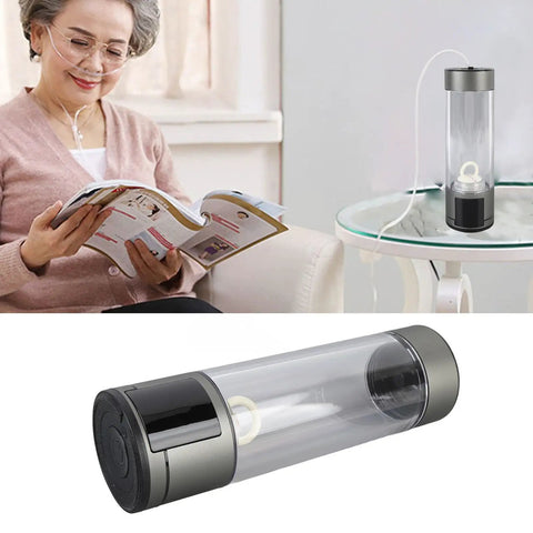 Portable 400ml Hydrogen Water Bottle Ionizer on table, with rechargeable Li battery, gray sealed design for travel use