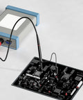 High Voltage Oscilloscope Probe P4100 Pro Grade Kit with probe connected to electronic circuit board for precise testing