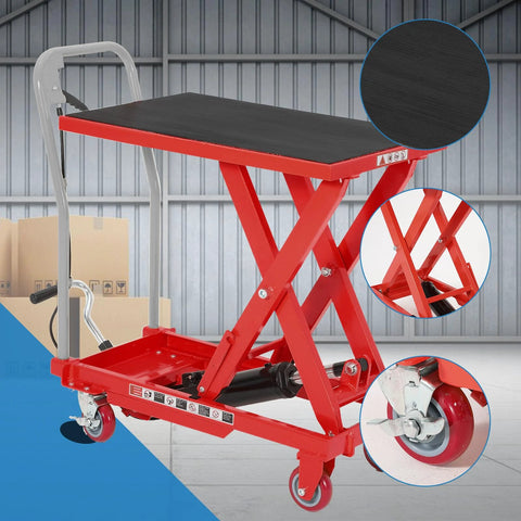 Front view of red heavy-duty hydraulic lift table cart with black non-slip platform and locking wheels