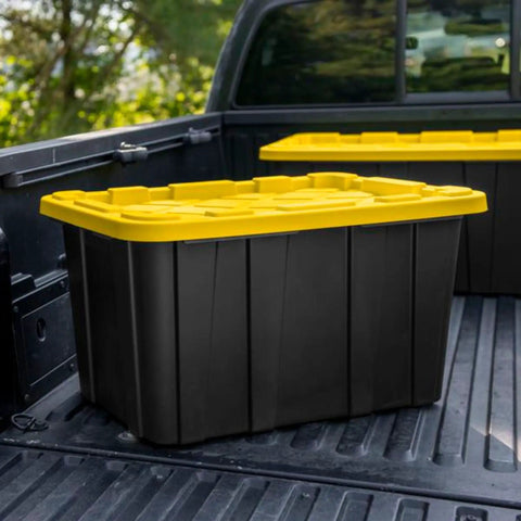 4 Pack 27 Gallon Heavy Duty Industrial Storage Tote With Lids in black and yellow shown in a truck bed