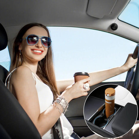 Woman in sunglasses holding coffee in car featuring Tesla Model Y Juniper Standard Center Console Organizer Set.