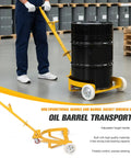 55 Gallon Drum Dolly With Swivel Wheels For Heavy Duty Drum Transport Haul Up To 1200 Lbs Like A Boss Durable Steel Construction Adjustable Ergonomic Handle From 28.94 To 38.4 Inches 360 Degree Steering For Smooth Moves. Yellow steel drum dolly with swivel wheels moving a black 55-gallon barrel in a warehouse.