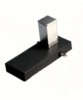 Magnetic hold-down clamp with silver rectangular magnet on black base; for laser engraving on honeycomb work tables.