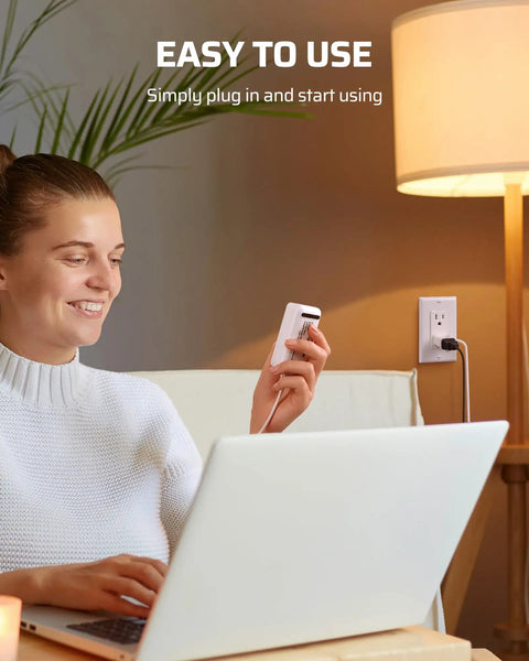 Person using Plug In Lamp Dimmer Switch For Dimmable LED CFL And Incandescent Bulbs, easy plug-in use with desk lamp.