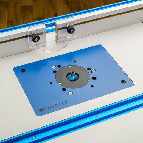 Top view of a Phenolic Router Plate B for Easy Lift and Quick Bit Changes on Your Router Table, installed in a wood table setup.