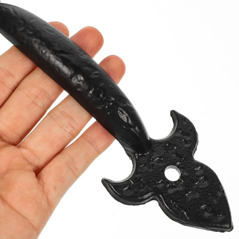 Hand holding Rustic Vintage Iron Cabinet Handles And Drawer Pulls For Dresser Wardrobe And Cabinet Hardware Bow Shaped Door Pulls