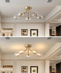 Day and night view of gold five light Sputnik style ceiling light semi flush mount with glass globe pendant lamps