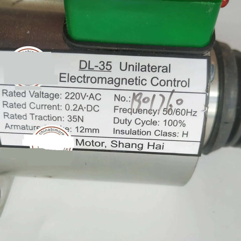 Close-up of Heavy Duty AC 220V Escalator Brake Electromagnet Elevator Spare Parts, label showing technical specifications.