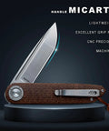 Edc Pocket Folding Knife With 3.5 Inch 14C28N Blade, Micarta Handle, CNC Machining, shown on a display