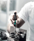 Person using Kraftform Micro Slotted And Phillips Electronics Screwdriver Set With Rack Six Piece Pro Grade Precision Ergonomic Handle.