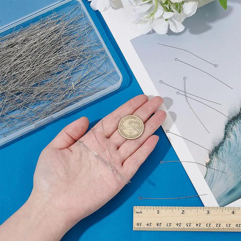 500Pcs 304 Stainless Steel Eye Pins 2.7 Inch Head Pins 24 Gauge Jewelry Findings With 3mm Heads And 3mm Eye Holes, Durable Craft Pins In Clear Storage Box, with ruler and hand
