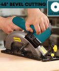 Side view of Enventor corded circular saw with teal body and 7-1/4 in blade cutting wood.