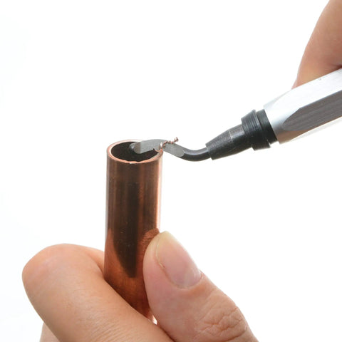Pro Series Deburring Blades Set Of 10 BS1010 For Steel Aluminum And Plastic 62-64 HRC in use on copper pipe