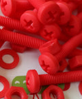 No Sweat 20 Piece Red Polypropylene Fastener Kit M6 X 60mm Phillips Pan Head Bolts with nuts and washers, close-up view.