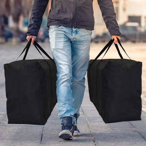 Person carrying Extra Large Moving Bags With Strong Zippers And Handles For Clothes Storage And Moving, 90 liter waterproof totes