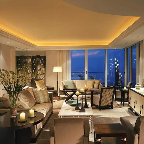 Luxurious living room with LED dimmer power driver for under-cabinet lighting, creating a warm ambiance with flicker-free dimming.