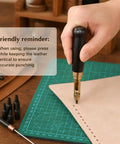 Slick Adjustable Leather Hole Punch With Solid Wood Handle Awl in use on leather, showing clear punctures with a brass mechanism.
