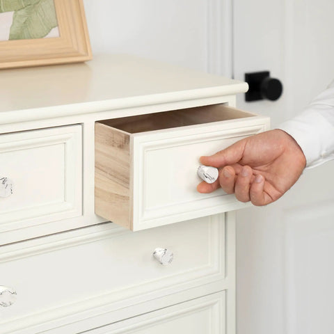 A hand pulling open a drawer featuring Hella Stylish White Marble Cabinet Knobs 10 Pack Dresser Hardware Modern Drawer Pulls.