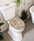 Round Stone wall Toilet Seat on a white toilet, featuring a sturdy resin design and soft-close hinge in a modern bathroom setting.