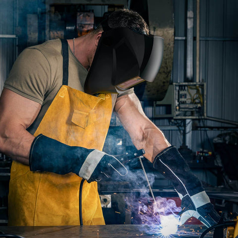 Person welding with Auto Darkening Solar Powered Welding Helmet With Adjustable Shade Range 4 9 To 13 For TIG MIG ARC Welder
