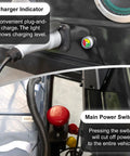 Charger indicator and main power switch details on Sleek Black 4-Seater Electric Golf Cart With Raised Stance, Heavy Duty Shocks.