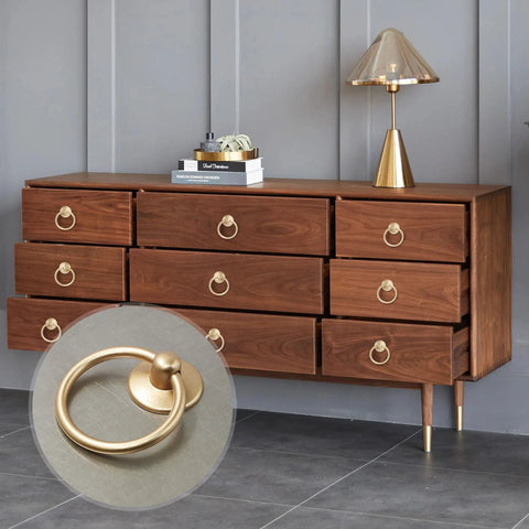 Champagne Gold Drop Ring Drawer Pulls Set Of 12 For Cabinets And Dressers installed on wooden dresser with vintage metal handles