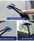 45 Piece Car Detailing Kit Beast With Pro Brush Set includes windshield cleaning tool in use for mist removal.