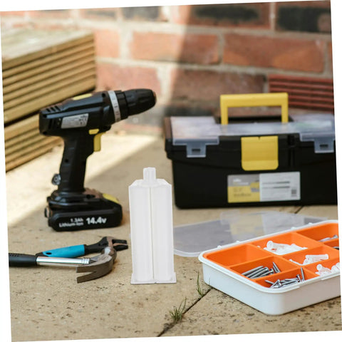 Dual Component Epoxy Adhesive Cartridge Kit With Reliable Flow Control That Works Like A Boss Ten Pack Mixing Tubes For Precise Bonding High Volume Dispensing For Arts And Crafts And Industrial Glue Projects Standard Nozzle Compatibility, white cartridge on workbench
