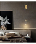 Premium Copper Wall Sconce Featuring Sparkling Crystal Accent Shades With Soothing Warm Led Glow For Contemporary Bedroom And Corridor Spaces An Absolute Flex That Delivers Major Smooth Anti Glare Vibes To Your Fresh Interior Setup above a modern bed with art.