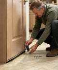 Man installing Kickass Heavy Duty Door Support Wheel Anti Sag Silent Roller for smooth closure on interior door.