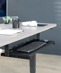 Large Height Adjustable Under Desk Keyboard Tray With Straight Up Smooth Glide Slide Out Platform Zero Hassle Ergonomic Typing Setup Rich Matte Black Computer Drawer with keyboard and mouse.