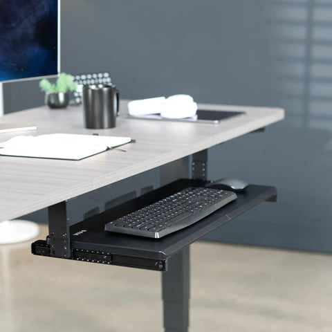 Large Height Adjustable Under Desk Keyboard Tray With Straight Up Smooth Glide Slide Out Platform Zero Hassle Ergonomic Typing Setup Rich Matte Black Computer Drawer with keyboard and mouse.