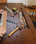 Top Shelf 5 Piece Forstner Drill Bit Set Woodworking Hinge Cutter Round Shank Multi Tooth Bits For Hardwood Softwood Plywood on workbench.