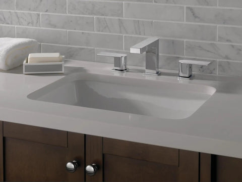 Xander Widespread Chrome Bathroom Faucet For Three Hole Six To Sixteen Inch Setup with High Arc Spout on countertop